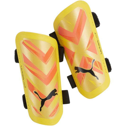 Puma Ultra Light Strap ποδοσφαίρου προστατευτικά κνήμης κίτρινο και πορτοκαλί 30875 09